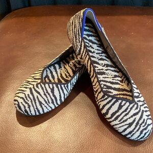Rothy’s, “The Flat”•tan and black animal print•7.5